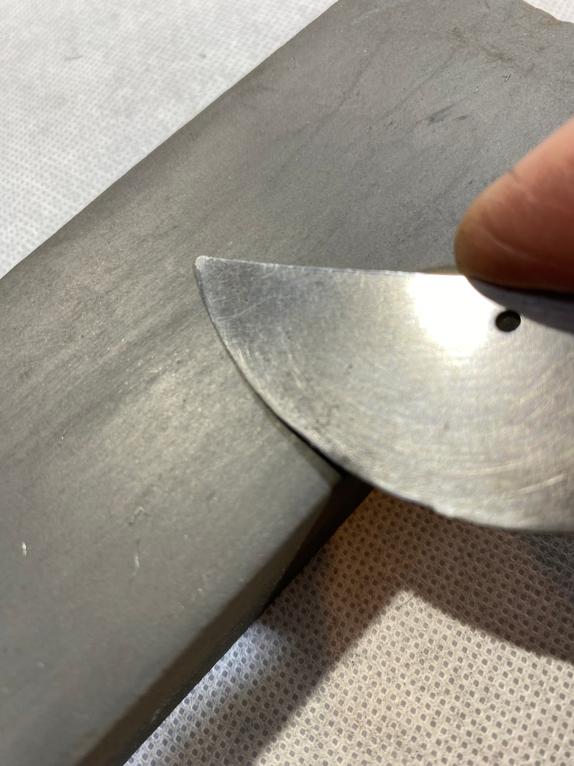 pruner blade sharpened on whetstone