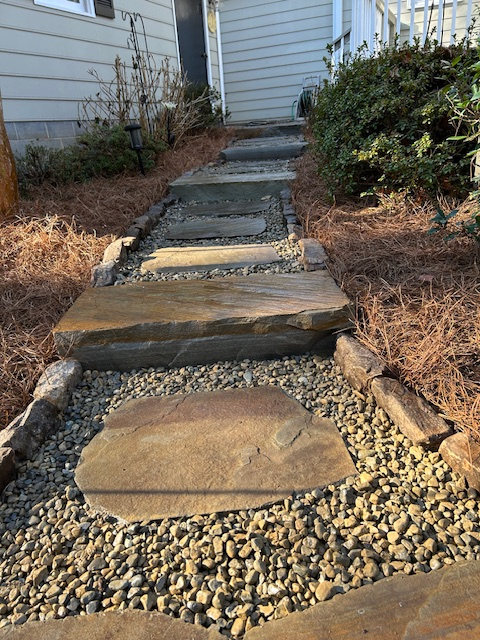 pea gravel and stone walkway with steps